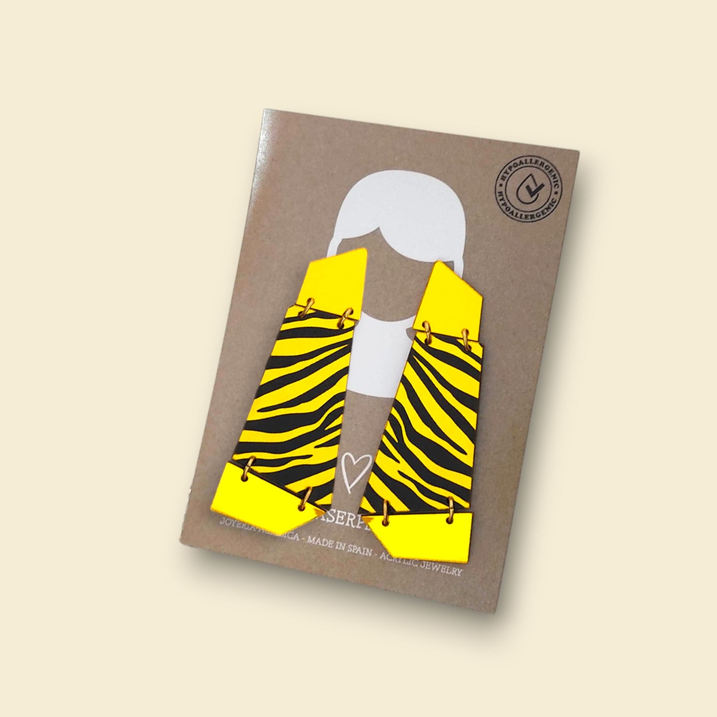 pendientes dorados  con estampado animal print, pendientes geométricos, pendientes llamativos, pendientes de espejo dorado